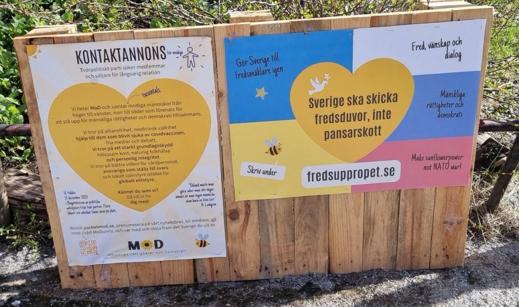 Pressmeddelande från partiet MoD | MoDs partiledare Andreas Sidkvist polisanmäler aktivisten Mathias Wåg för ofredande 2 mods affischer kontaktannons fredsupprop som revs ner stor